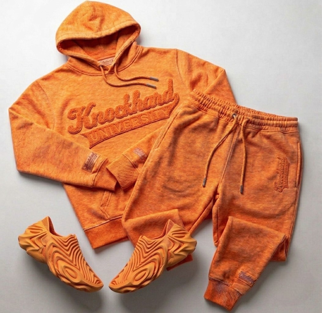Knockhard University tracksuit in Solar — Sun-fired orange